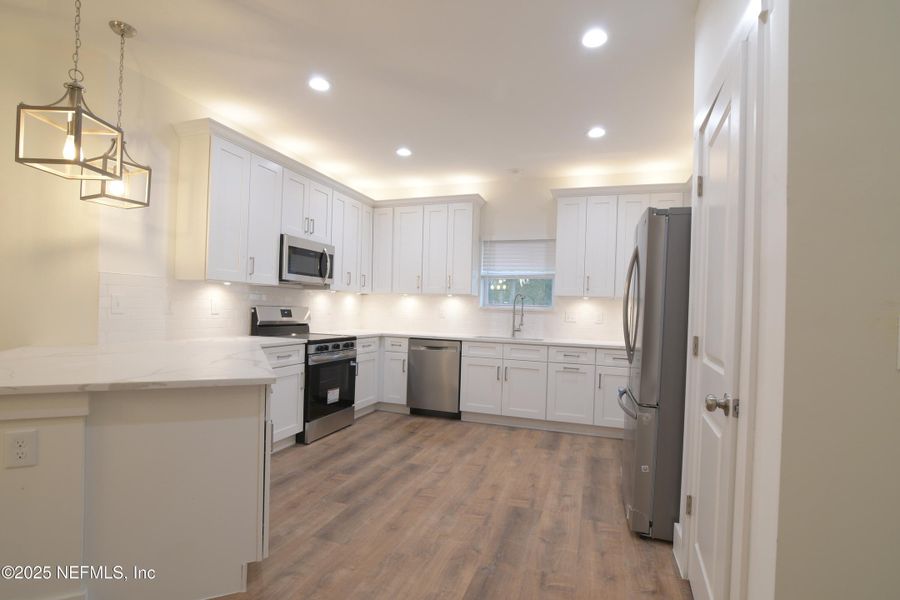Furnished interior view inside a new home in , Jacksonville (Image 17).