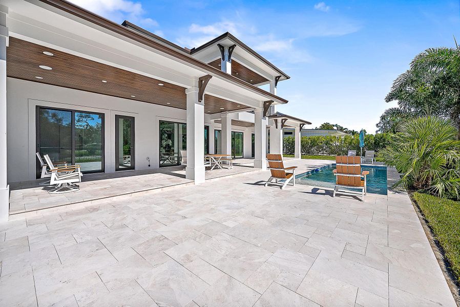 Exterior details and patio area of a home in , Tequesta (Image 1).