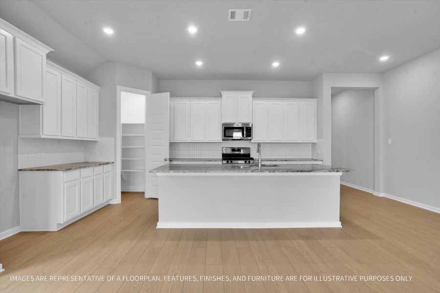 Furnished interior view inside a new home in River Ranch 55', Dayton (Image 3).
