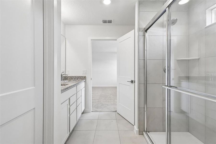 Furnished interior view inside a new home in Grasslands West, Lakeland (Image 12).