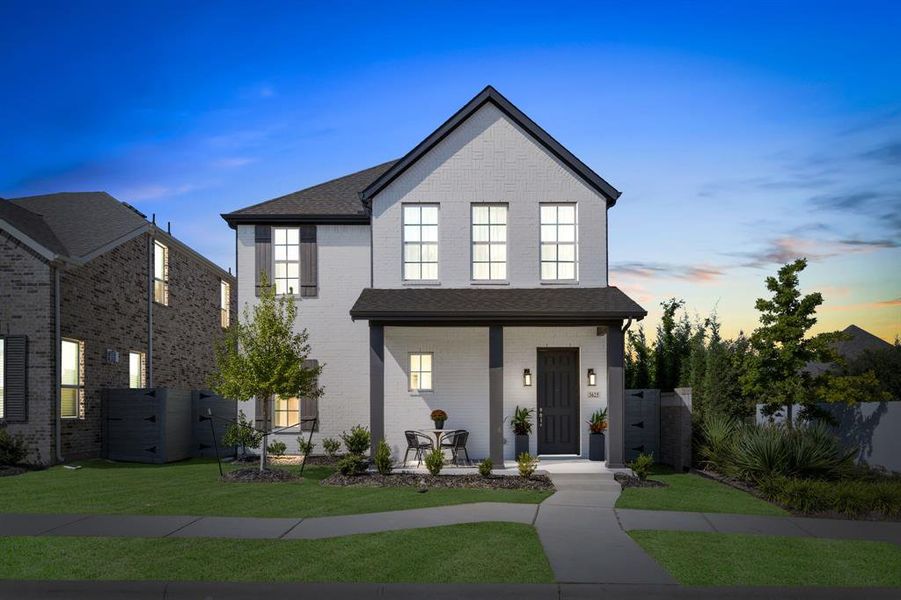 View of front of home featuring a yard