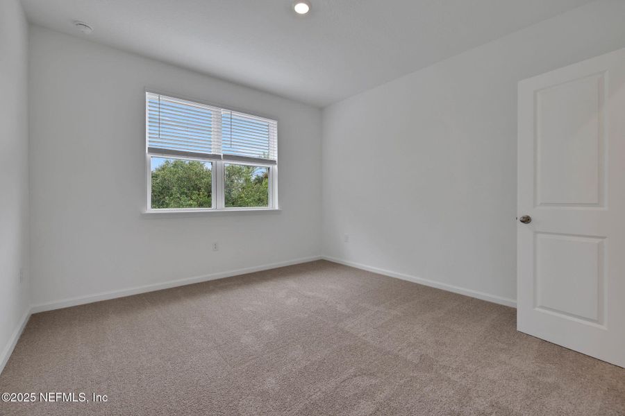 Spacious, unfurnished interior of a new home in The Hammock at Palm Harbor, Palm Coast (Image 21).