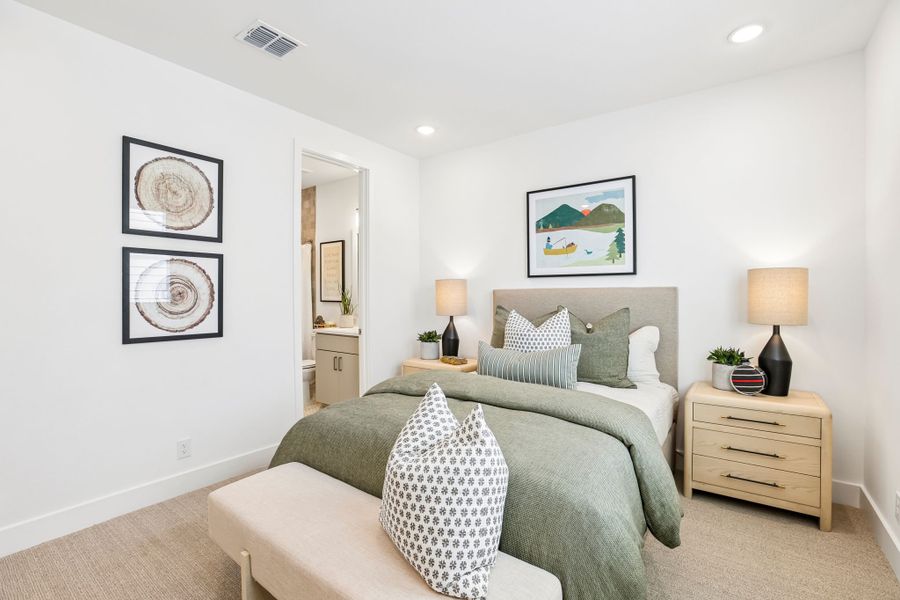 Representative furnished interior of a home built from the 5051 by Risewell Homes in Freedom at Anthem, Kyle (Image 24).