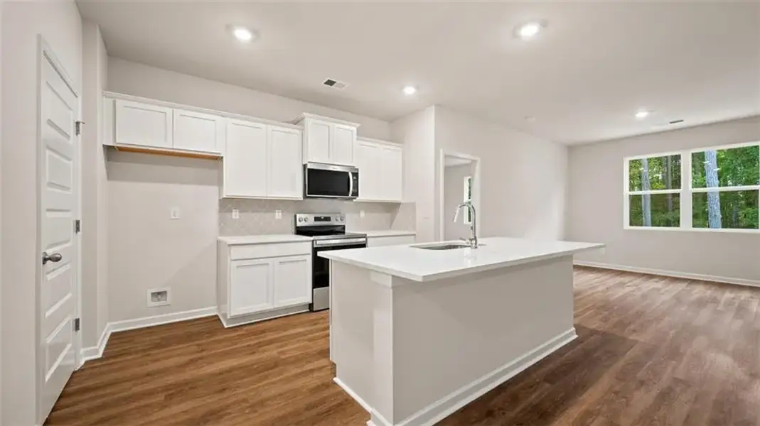 Furnished interior view inside a new home in Champion's Run, Lithonia (Image 8).