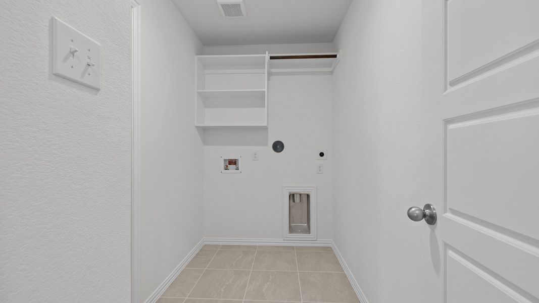 Furnished interior view inside a new home in Oakwood Estates, Waller (Image 21).