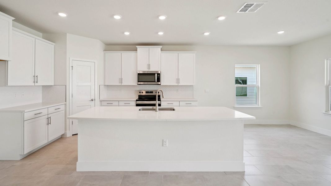 Representative furnished interior of a home built from the LANTANA by D.R. Horton in Buchanan Trails, Newberry (Image 15).