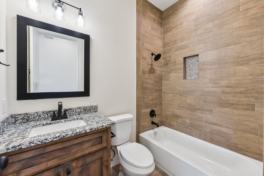 3rd Bathroom featuring toilet, bathtub / shower combination, and vanity 3rd Bathroom featuring toilet, bathtub / shower combination, and vanity