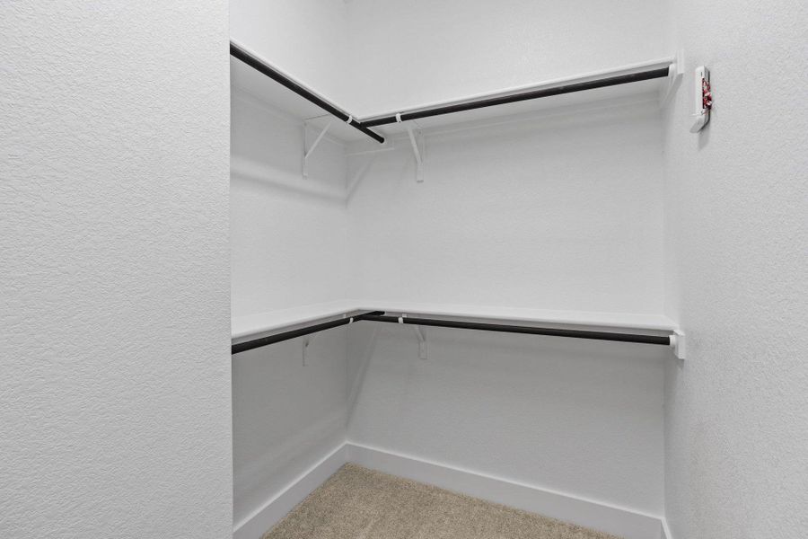 Walk-in closet in Primary Bedroom