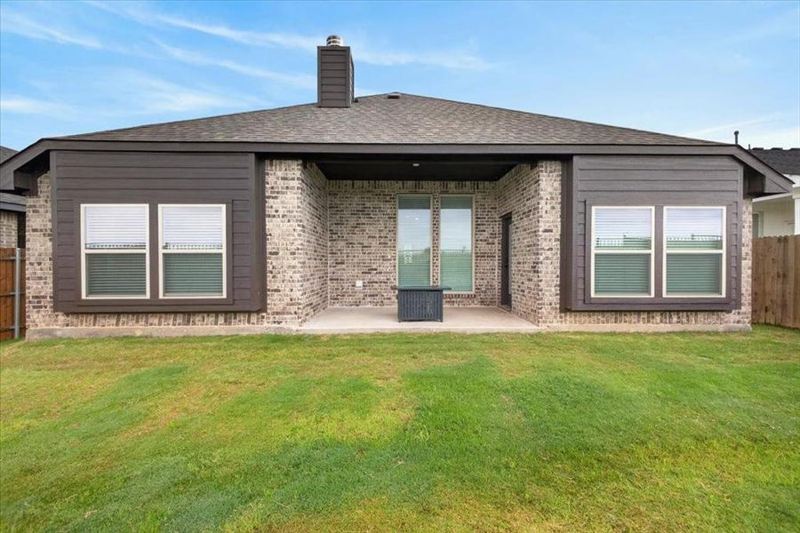 Exterior details and patio area of a home in , Godley (Image 24).