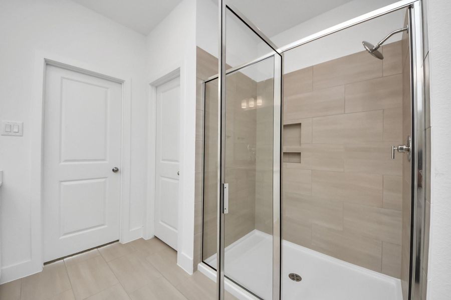 Furnished interior view inside a new home in The Canopies, Splendora (Image 6).