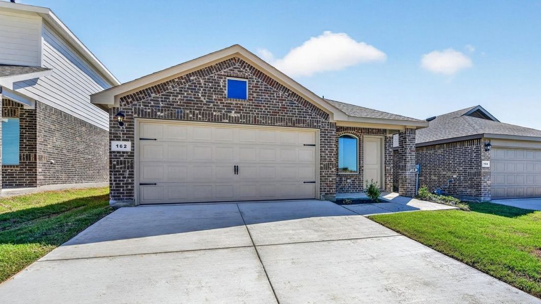 Representative exterior photo of a completed home built from the Diana by D.R. Horton in The Hills at Reunion, Newark, TX (Image 18). Representative exterior photo of a completed home built from the Diana by D.R. Horton in The Hills at Reunion, Newark, TX (Image 18).