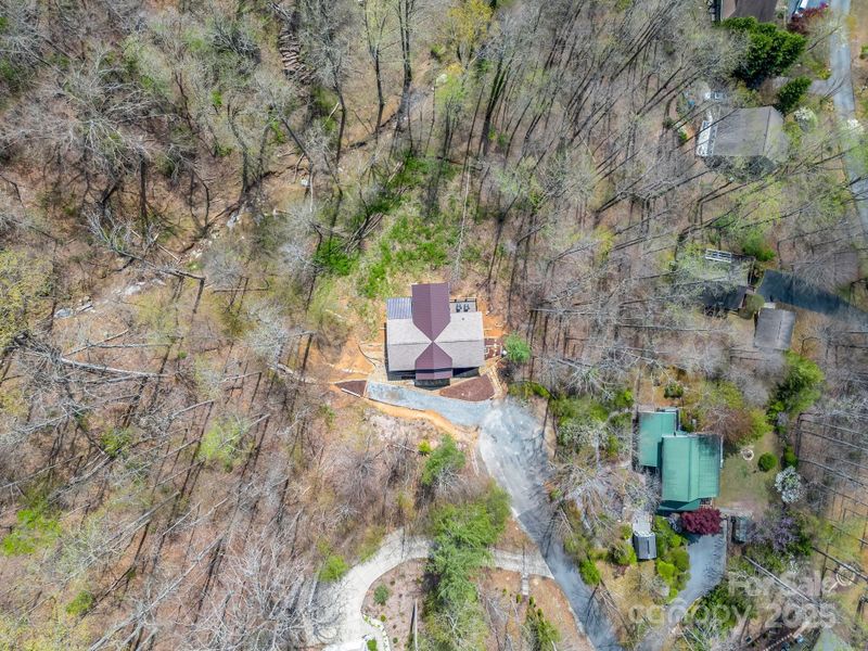 Site preparation for new homesites in , Hendersonville (Image 34).