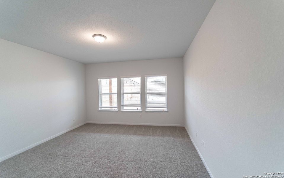 Spacious, unfurnished interior of a new home in Red Hawk Landing, San Antonio (Image 13).
