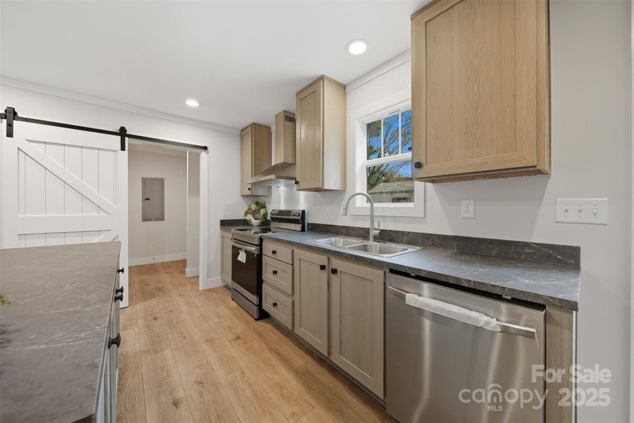 Furnished interior view inside a new home in , Lenoir (Image 7).