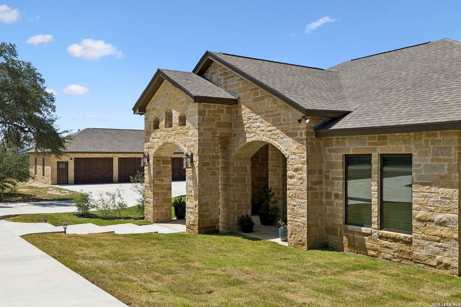 Front exterior of a new home in , Bandera, TX, highlighting curb appeal (Image 23). Front exterior of a new home in , Bandera, TX, highlighting curb appeal (Image 23).