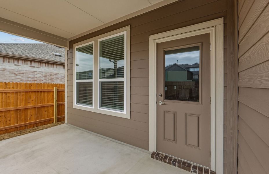 Exterior details and patio area of a home in Crosswinds, Kyle (Image 26).