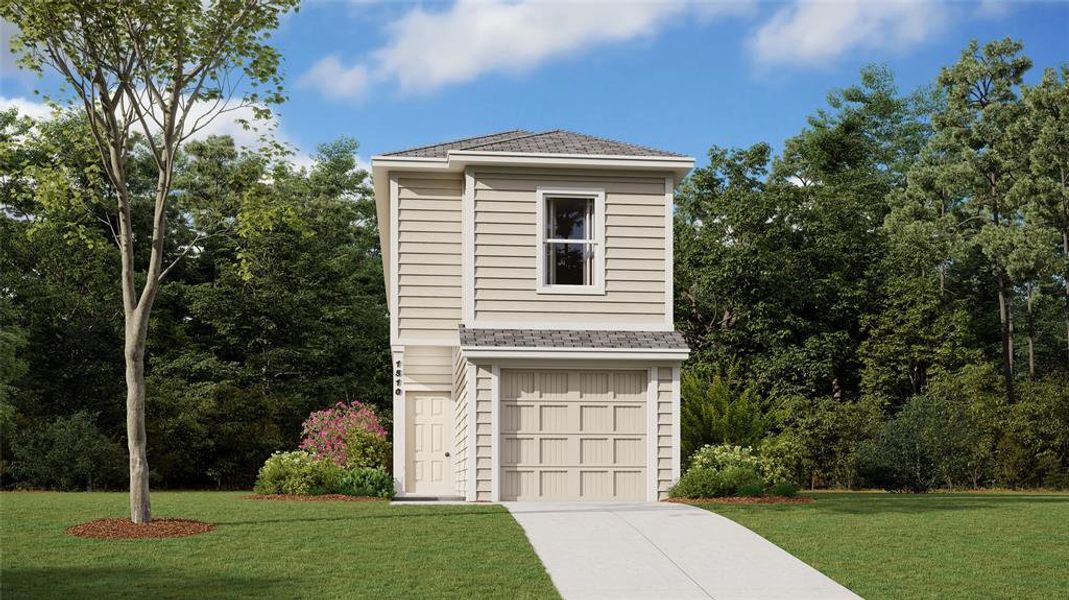 View of front of house with a front lawn and a garage