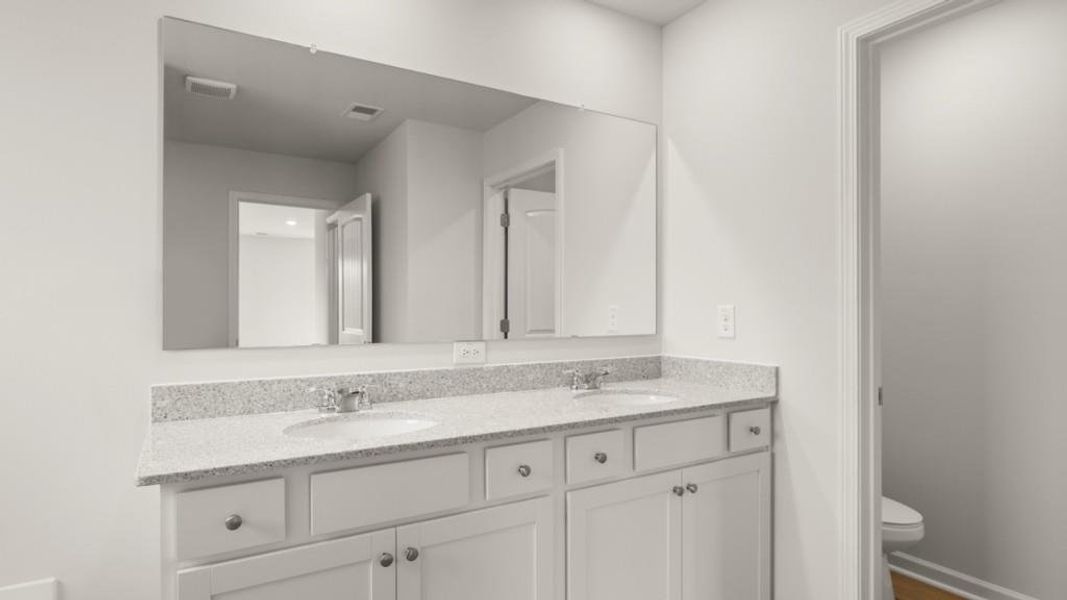 Furnished interior view inside a new home in Fairway 17 at Mirror Lake, Villa Rica (Image 6).