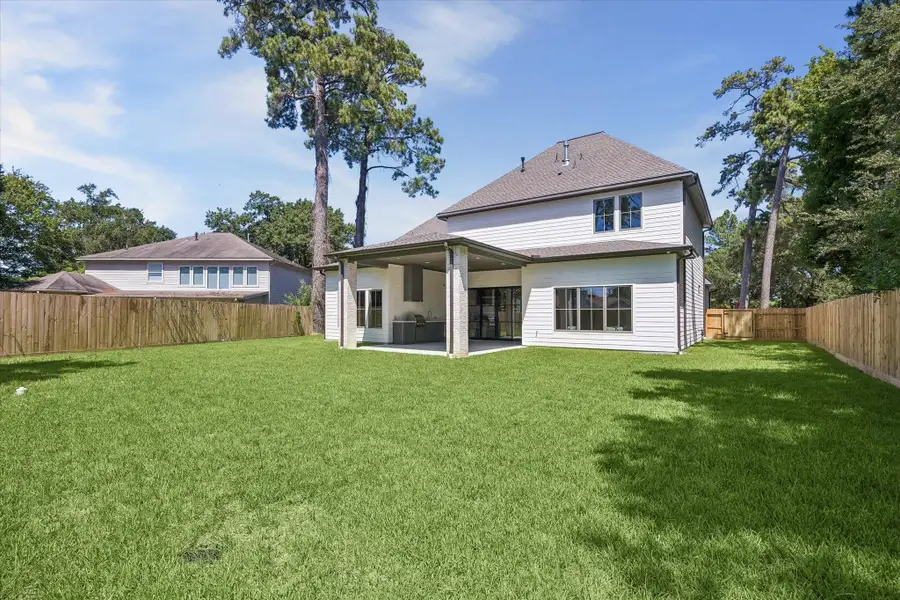 The oversized backyard provides an abundance of green space with plenty of room to customize your dream outdoor oasis, including a future pool if desired.