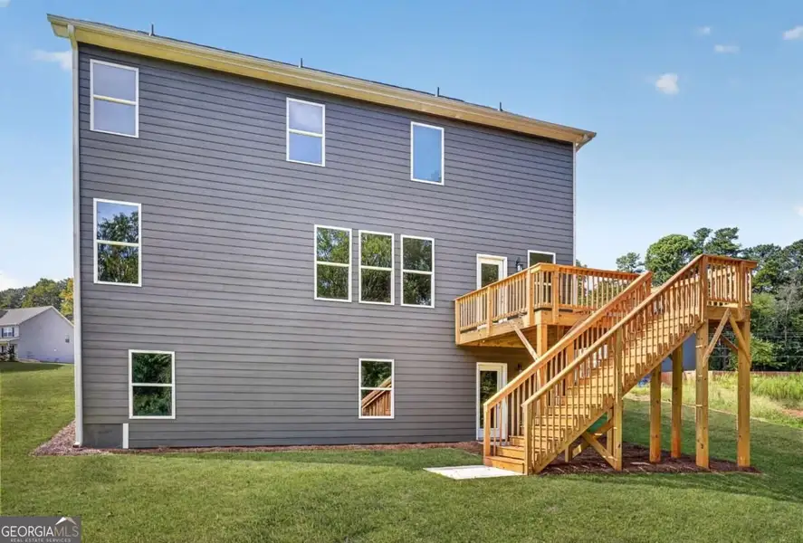 Exterior details and patio area of a home in Austin Ridge, Commerce (Image 18).