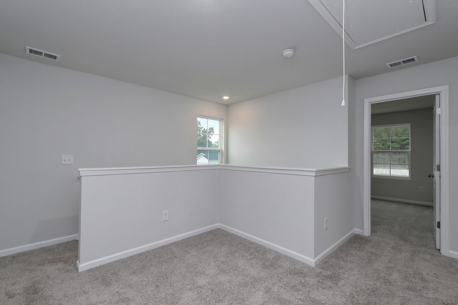 Spacious, unfurnished interior of a new home in Hainer Place, Conway (Image 25).