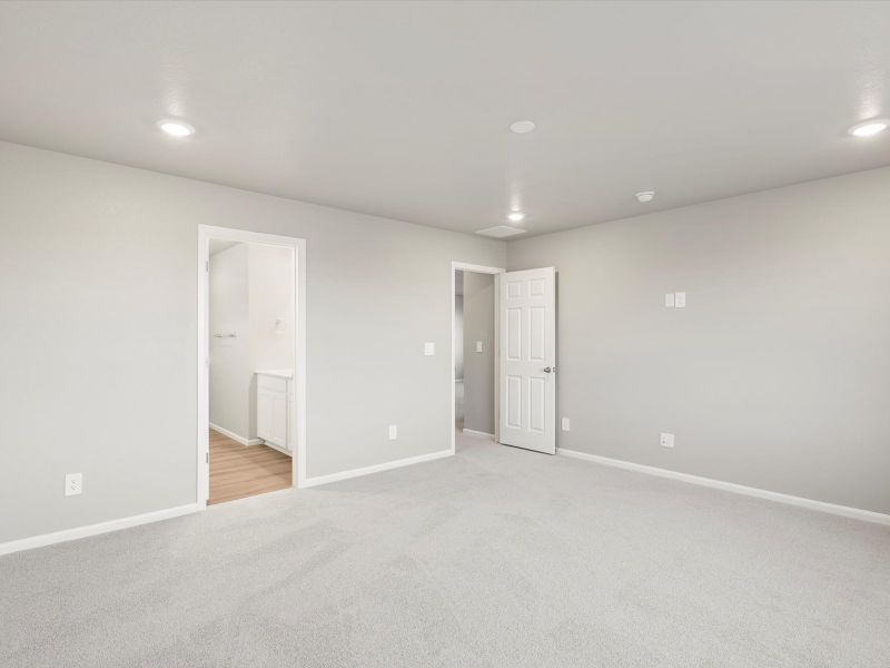 Spacious, unfurnished interior of a new home in Buffalo Highlands: The Flora Collection, Commerce City (Image 10).