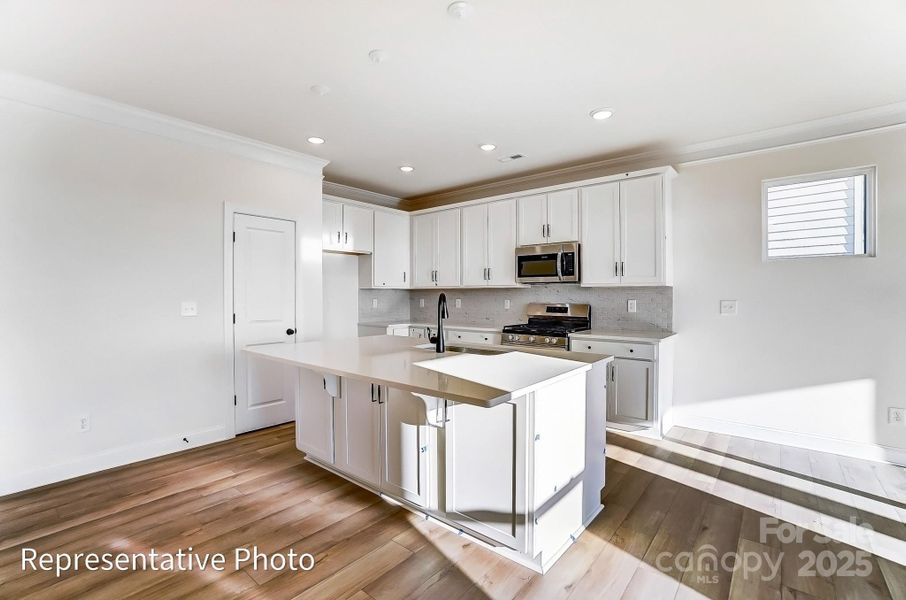 Furnished interior view inside a new home in Heritage - 55+ Community, Indian Trail (Image 8).