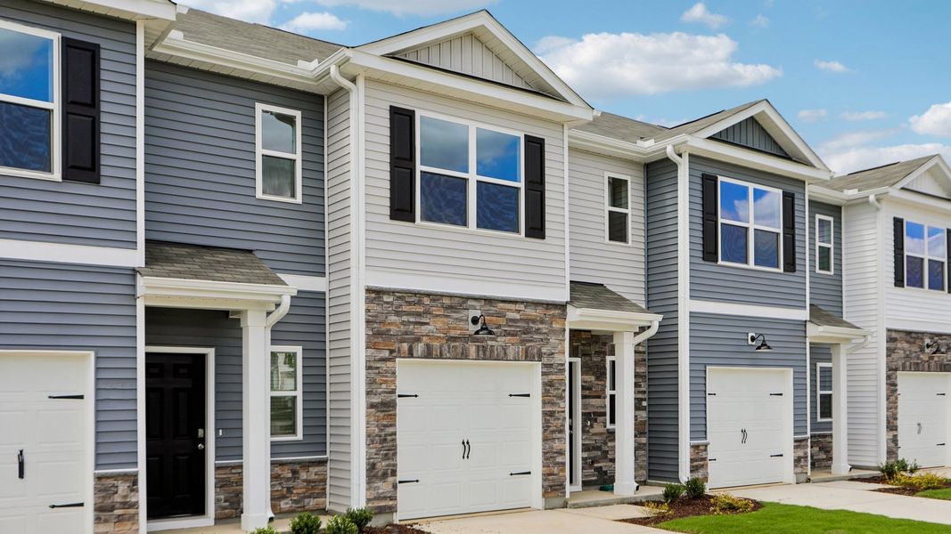 Representative exterior photo of a completed home built from the Payton by D.R. Horton in The Townes at Laurel Oaks, Sanford, NC (Image 17).