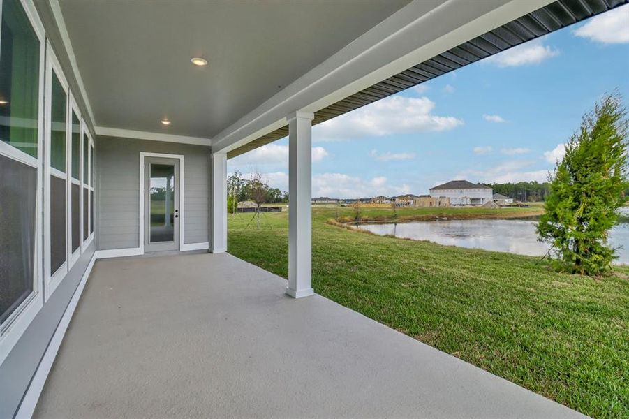 Exterior details and patio area of a home in Ardisia Park Estate, New Smyrna Beach (Image 2).