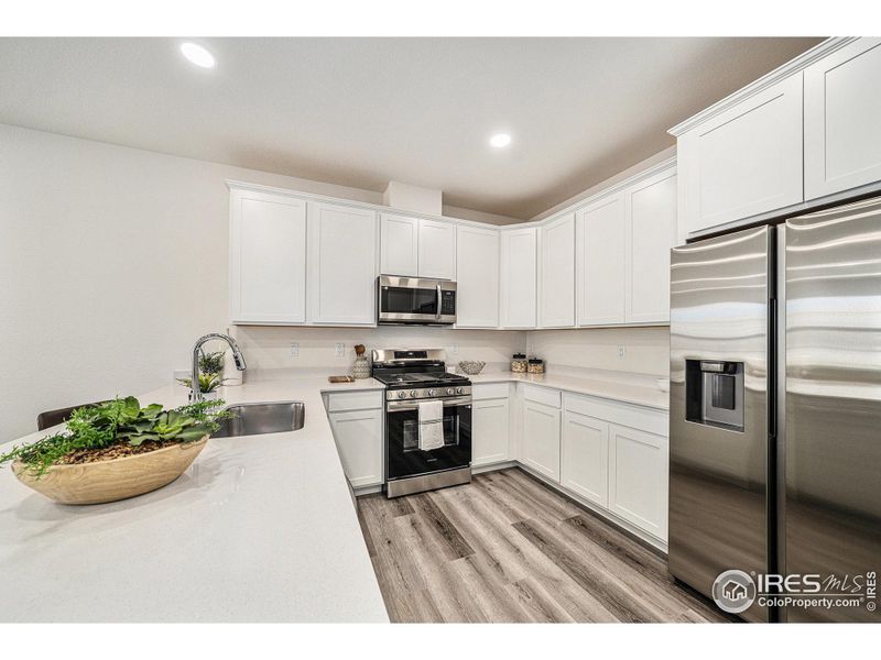 Furnished interior view inside a new home in Eagle Brook Meadows, Loveland (Image 9).