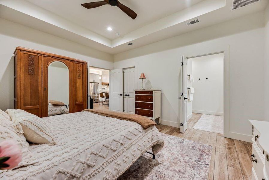 Amazing Primary Bedroom with custom closet and resort style Primary bathroom