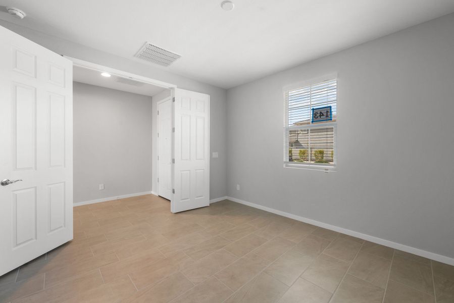 Spacious, unfurnished interior of a new home in Blossom Rock, Apache Junction (Image 21).