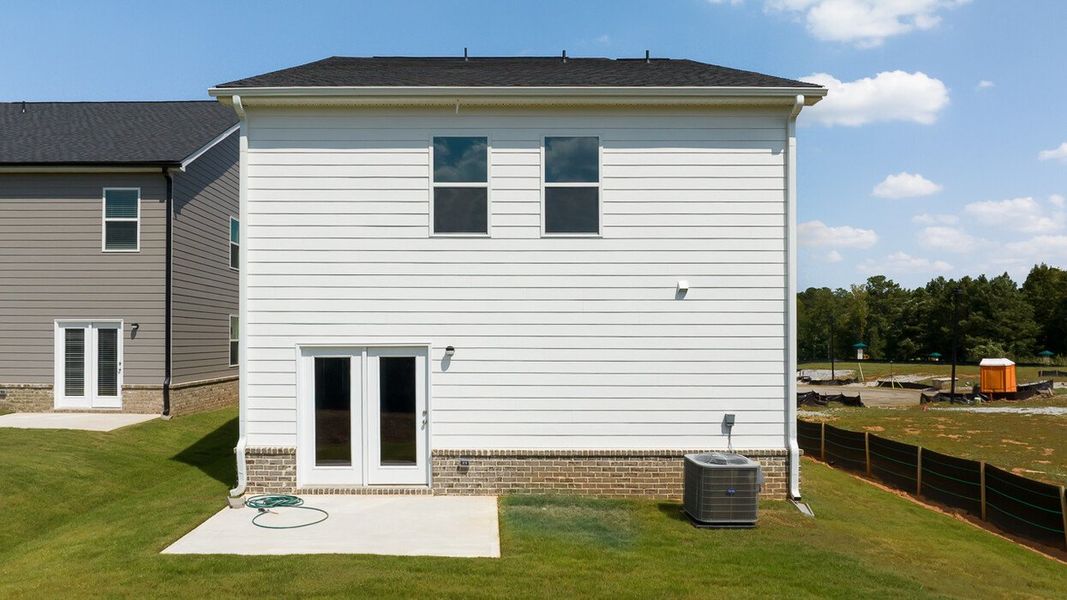 Exterior details and patio area of a home in Shoal Creek, Hampton (Image 2). Exterior details and patio area of a home in Shoal Creek, Hampton (Image 2).