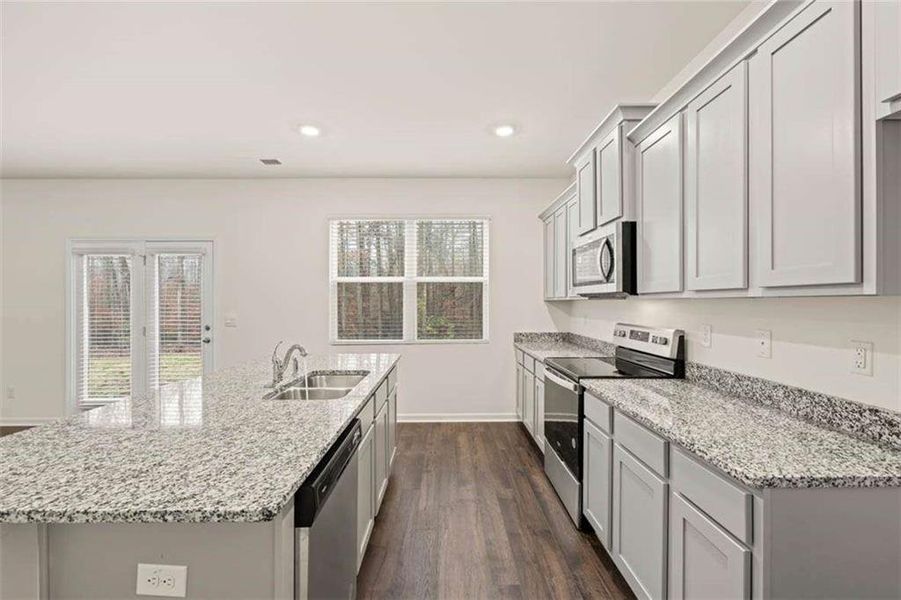 Furnished interior view inside a new home in Oakchase at Hampton, Hampton (Image 43).