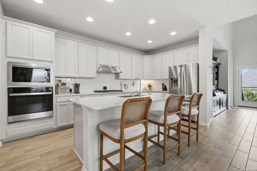 Furnished interior view inside a new home in Bison Ridge, San Antonio (Image 38).