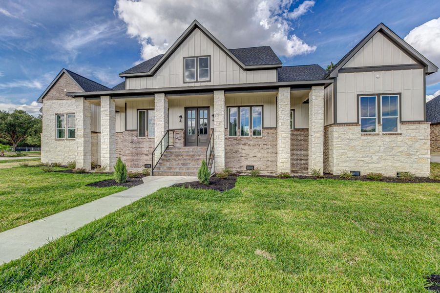 Front exterior of a new home in , Cypress, TX, highlighting curb appeal (Image 2).