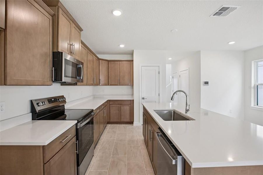 Furnished interior view inside a new home in Grasslands West, Lakeland (Image 7).
