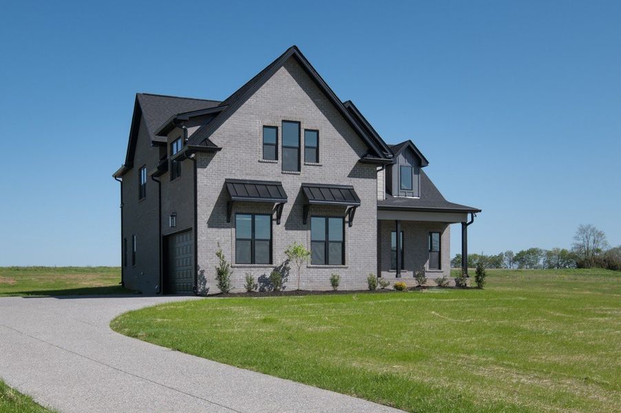Front exterior of a new home in Whisper Hill, Wendell, NC, highlighting curb appeal (Image 31).