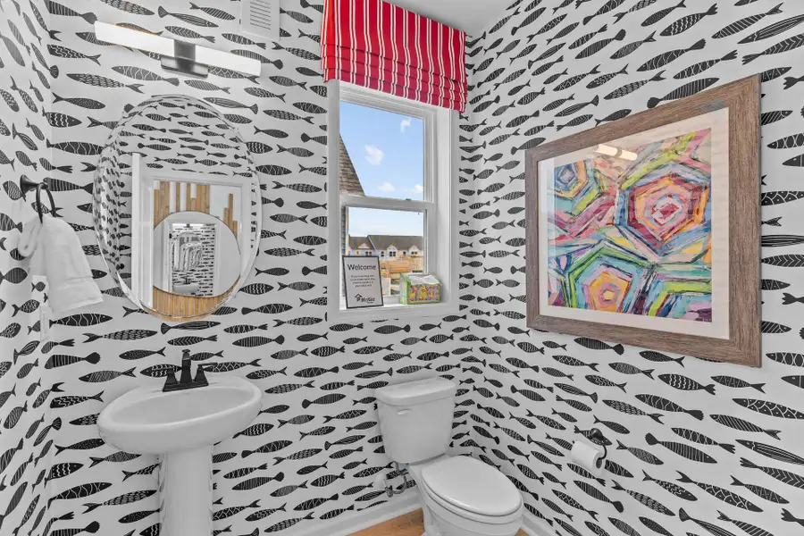 Representative furnished interior of a home built from the Turlington by McKee Homes in Coastal Haven, Leland (Image 4).