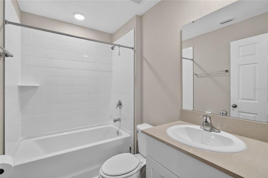 Furnished interior view inside a new home in Forest Lake, Davenport (Image 11).