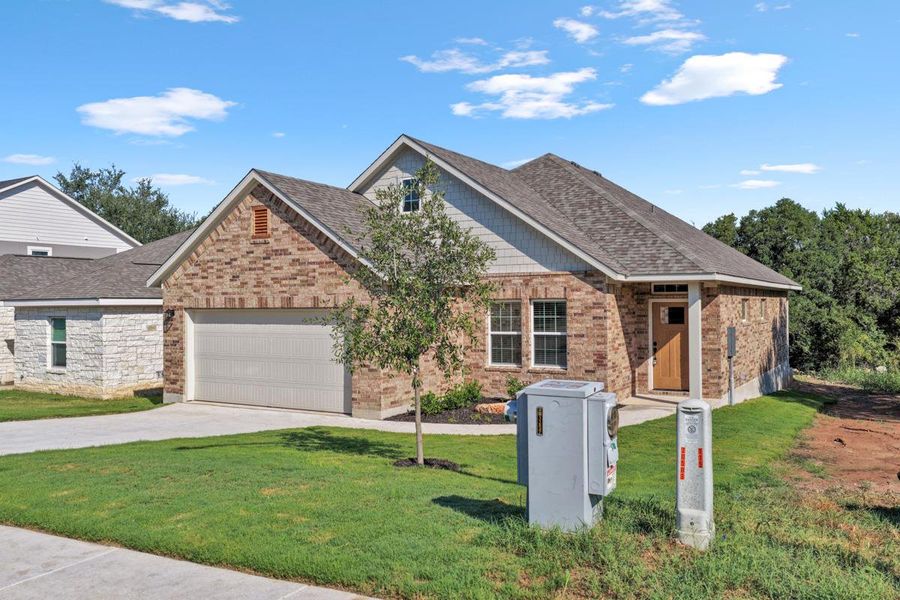 Front exterior of a new home in , Marble Falls, TX, highlighting curb appeal (Image 19). Front exterior of a new home in , Marble Falls, TX, highlighting curb appeal (Image 19).