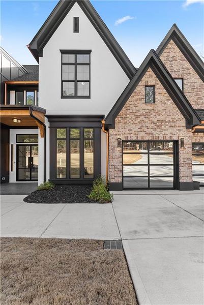 Front exterior of a new home in , Loganville, GA, highlighting curb appeal (Image 35). Front exterior of a new home in , Loganville, GA, highlighting curb appeal (Image 35).
