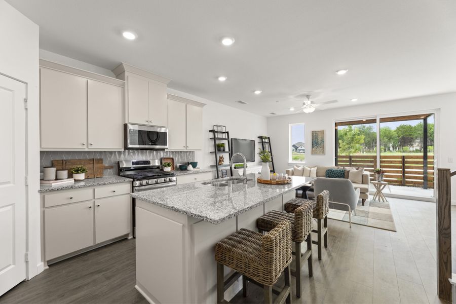 Representative furnished interior of a home built from the Granite (FE) by Grenadier Homes in Wildridge, Oak Point (Image 3).