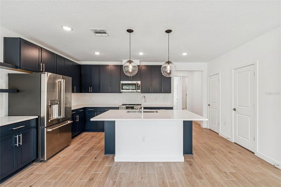Furnished interior view inside a new home in Aspire at Canter Creek, Davenport (Image 8). Furnished interior view inside a new home in Aspire at Canter Creek, Davenport (Image 8).