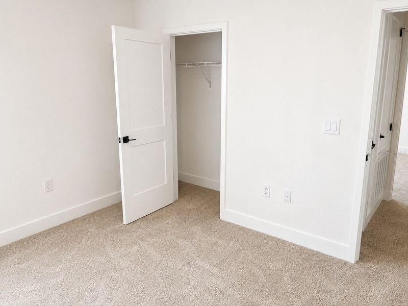 Spacious, unfurnished interior of a new home in Harmony Central, St. Cloud (Image 10).