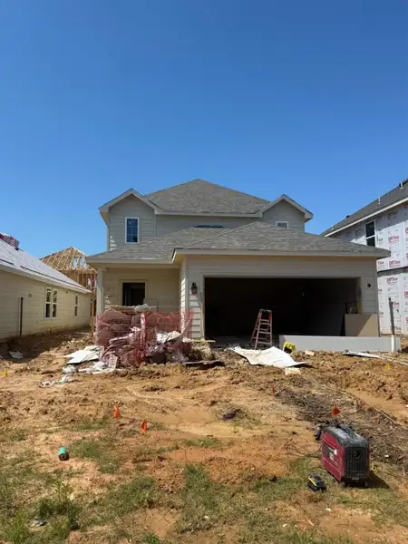 In-progress construction of a new home in River's Edge, Conroe, TX (Image 35).