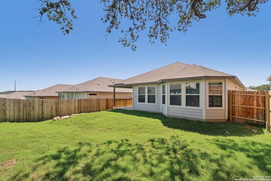 Front exterior of a new home in Scenic Crest - Premier Series, Boerne, TX, highlighting curb appeal (Image 25).