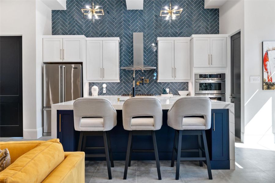 Model home view of kitchen with floor to ceiling tile! Model home view of kitchen with floor to ceiling tile!