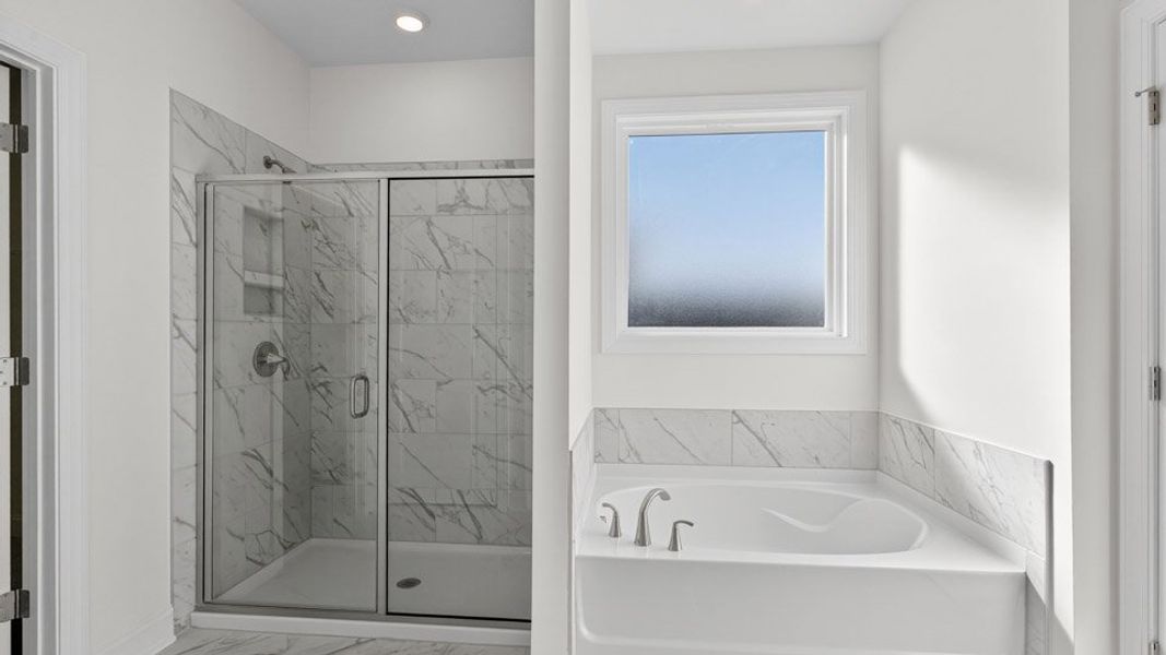 Furnished interior view inside a new home in The Estates Park, Apex (Image 9).