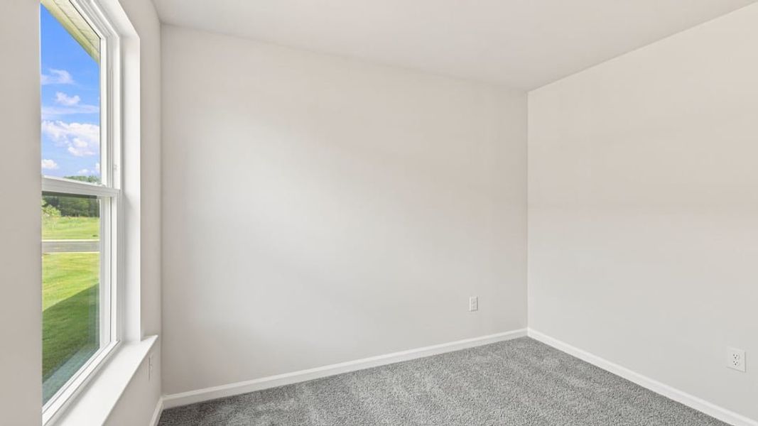 Spacious, unfurnished interior of a new home in Village 3, Woodruff (Image 24).